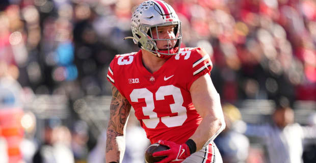 Ohio State Buckeyes defensive end Jack Sawyer celebrates a play during a college football game in the Big Ten.